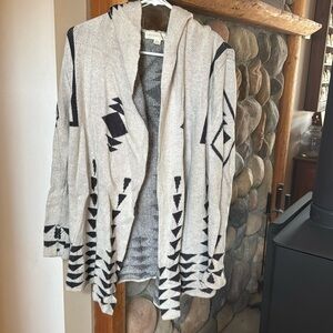 Cardigan sweater with adorable print. Size small/medium